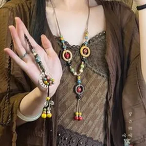 Bohemian ethnic style long necklace with colorful ceramic beads and tassel pendant for women