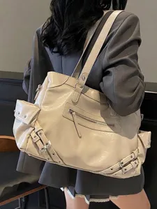 Creamy white oversized motorcycle style shoulder bag for college or commuting