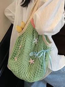 Large green crochet mesh tote bag for women with starfish charms and blue ribbon