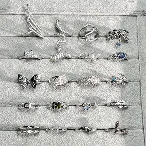 Selection of elegant silver-toned rings with intricate micro-pave crystal designs