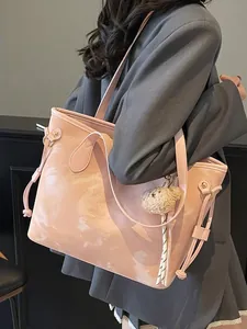 Bolso tote rosa minimalista de gran capacidad, ideal para el trabajo y la universidad.