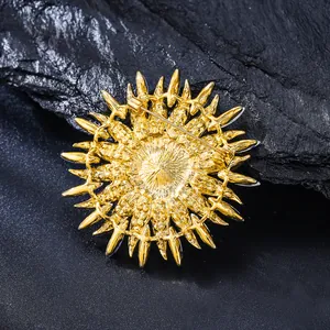 Detailed back view of golden sunflower brooch showing pin and secure clasp mechanism