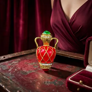 Elegant vintage French vase brooch featuring red enamel gold grid and green gemstone