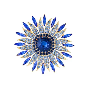 Elegant blue crystal sunflower brooch pin for women, formal banquet dress accessory.
