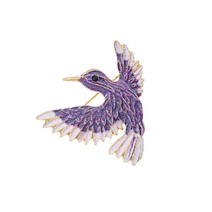 Elegante lila glitzernde Kolibri-Brosche mit Goldakzenten, Modeschmuck für Mäntel.