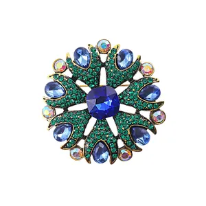 Eleganter Vintage-Seestern-Brosche mit tiefblauen Kristallen und grünen Strass