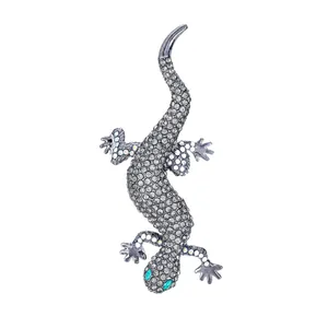 Elegant vintage lizard gecko brooch pin with shimmering rhinestones for suits and dresses