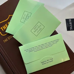 Professional silver polishing cloth in light green packaging for premium jewelry care