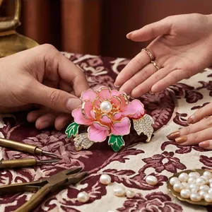 Elegant Chinese style peony flower brooch with pink enamel petals and center pearl accent