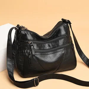 Vintage black washed soft leather crossbody bag with multiple zip pockets for women