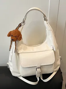 Zaino e borsa a tracolla bianca versatile di grande capacità con ciondolo a cane