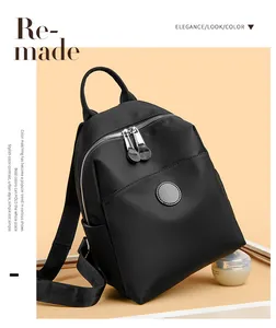 Side view of a sleek black waterproof nylon backpack for women's daily commute