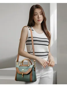 Elegant two-tone green and brown woven crossbody handbag shown on an Asian female model