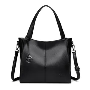 Stylish large capacity black leather tote bag with kangaroo logo and shoulder strap