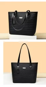 Detailed visual of a black woven PU leather tote bag showing front and side angles.