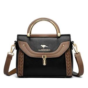 Sophisticated women's crossbody shoulder bag with unique woven detail and contrast colors