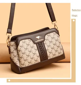 Elegant brown printed crossbody square bag with kangaroo logo and gold hardware