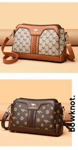 Detailed view of the printed women's crossbody bag with kangaroo logo