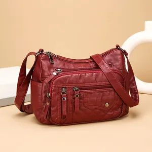 Trendy rode zachtleren crossbodytas met meerdere compartimenten en zakken voor dames