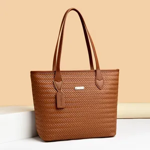 Stylish brown woven PU leather tote bag for women, large capacity shoulder handbag.