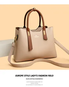 Elegante borsa tote in pelle PU beige e marrone con raffinati dettagli metallici dorati.