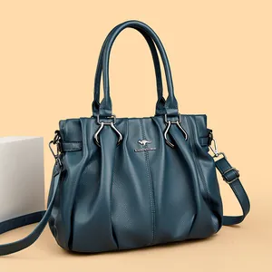 Elegante bolso de mano de piel plisada azul oscuro para mujer con logo de canguro y bandolera