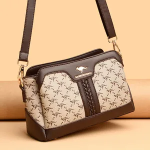 Fashionable printed small square crossbody bag with iconic kangaroo logo and gold accents