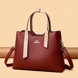 Elegante borsa a mano in pelle PU bordeaux e beige con tracolla rimovibile