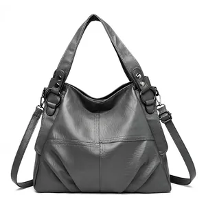 Elegante bolso de mano de cuero PU gris para mujer con costuras y correa ajustable