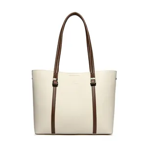 Elegante bolso tote grande blanco crema con asas marrones y logo de canguro grabado