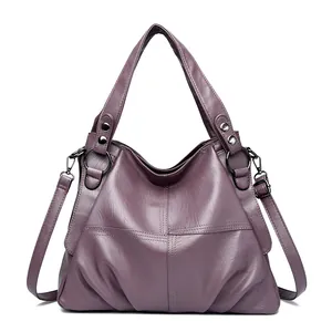 Elegante bolso grande de cuero PU morado con asas superiores y correa ajustable