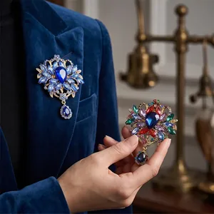 Elegant vintage alloy rhinestone brooches featuring large crystals in blue and multicolor