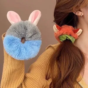 Soft and cozy plush cartoon animal ear scrunchies for stylish winter bun hairstyles