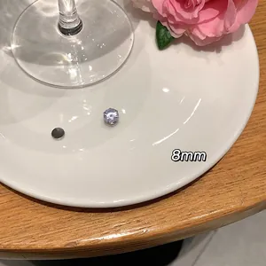 Detailed close-up showing 8mm zircon magnetic earring for non-pierced ears on a white plate