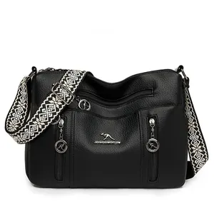 Elegant black women crossbody bag featuring lychee texture and wide patterned strap
