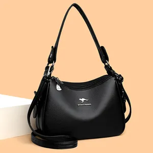 Elegant black leather crossbody shoulder bag for women with a silver kangaroo logo