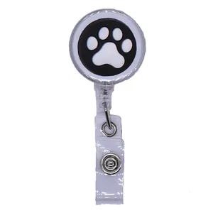 Retractable badge reel featuring a cute black and white cat paw print pattern detail