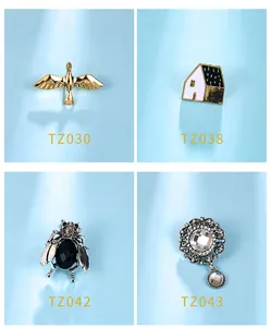 Selection of four decorative enamel and rhinestone brooch pins for shirts with SKU codes