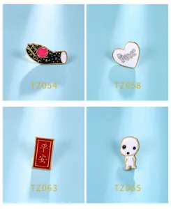 Selection of four unique decorative cartoon enamel pins featuring celestial and heart designs