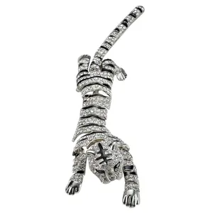 Exquisite silver tiger brooch with sparkling rhinestones and black enamel stripes