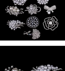 Detailed view of various elegant pearl and rhinestone brooches on black background