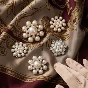 Collection of elegant pearl and rhinestone flower brooches for suits and dresses
