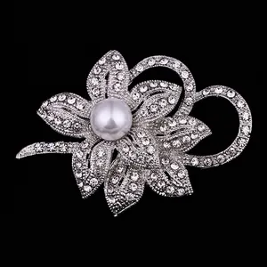 Elegant silver flower brooch with white pearl and sparkling rhinestones for coats and sweaters