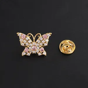 Butterfly brooch with pink and white cubic zirconia stones in gold plating finish