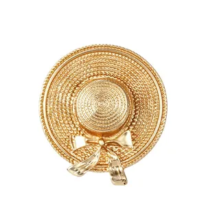 Vintage baroque style gold straw hat brooch with bow detail for elegant accessorizing