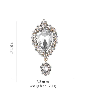 Detailed dimension diagram for waterdrop crystal brooch for suits, size 70mm by 33mm.