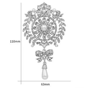 Detailed dimension view of ornate crystal brooch with white teardrop pearl pendant