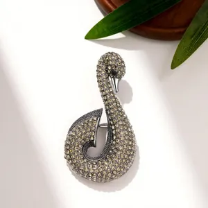 Broche de cisne de lujo con cristales champán para accesorios elegantes de abrigos y trajes