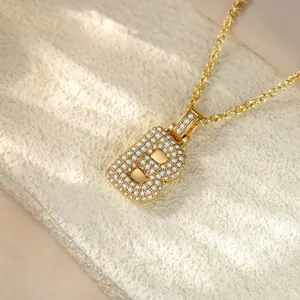 Detailed macro view of high-quality gold-plated iced out letter B hip hop pendant