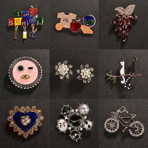 Elegant collection of various fashion brooches with rhinestones and unique designs